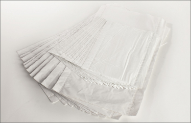 Poly-Backed Tissue Pad